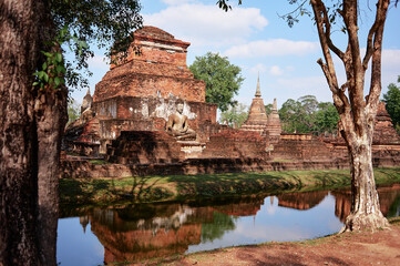 Fototapeta na wymiar Sukhothai, Pagoda at One of the famous temple in Sukhothai,Temple in Sukhothai Historical Park, Sukhothai Province,Thailand. UNESCO world heritage