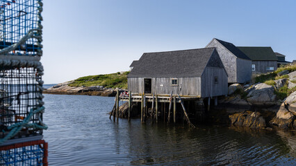 Photograph of a fishing hut in a fishing village, a peaceful setting in the heart of nature
