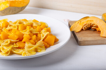 Pasta with pumpkin. Vegetarian autumn dish.