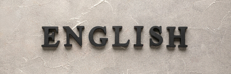 Word ENGLISH on grunge grey background