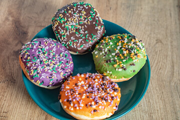 Plate for delicious donuts for Halloween on table