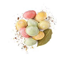 Colorful raw dumplings with spices and bay leaf on white background