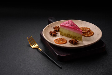 Delicious sweet cheesecake cake with mascarpone cheese, raspberries and jam