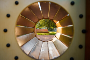 Wooden tunnel on the playground. Selective focus