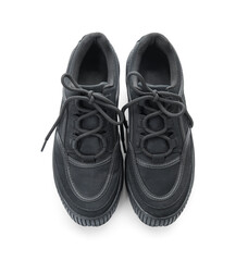 Stylish black sneakers on white background