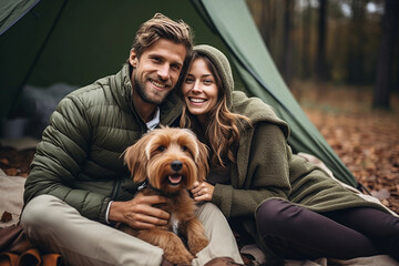 Young  couple out camping with their dog
