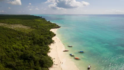 Selbstklebende Fototapete Zanzibar Beautiful white sandy beach and turquoise ocean in zanzibar at sunny day, Tanzania
