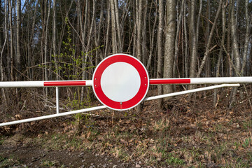 Barrier with no passage sign in the forest