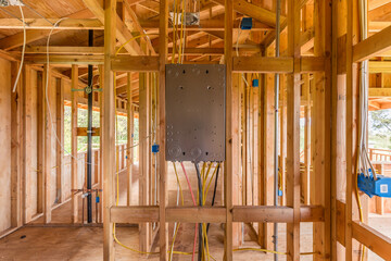 New Home construction with wood and electrical wiring - obrazy, fototapety, plakaty