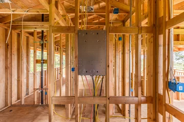 New Home construction with wood and electrical wiring © Kelly Headrick