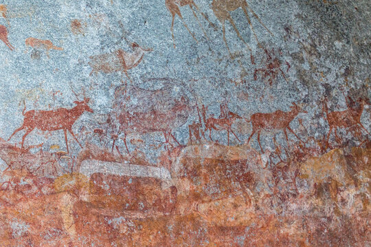 Bushmen Stone age prehistoric rock art in the cave Matobo Hills, Zimbabwe