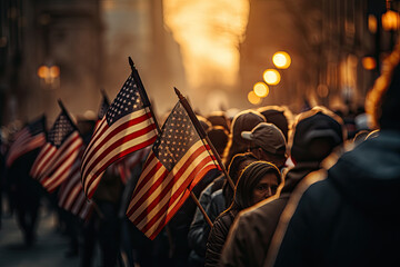 Group of American activists with US flags celebrate on a city street in cold autumn day at sunset