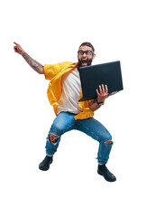 Jumping crazy programmer, web developer or designer holding laptop in his hands and pointing to...