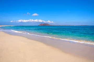 Glasbilder Kanarische Inseln View on Corralejo beach and Lobos island, blue water and golden sand and the Canary Island Fuerteventura, Spain.