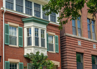 Old brick building with bay window in Boston, MA, USA