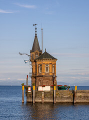 historical lighthouse at the harbor entrance from Lake Constance to Konstanz