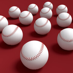 Set of softball or baseball ball lying in row on red background.
