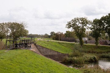 Fototapeta na wymiar Inlet sluice Beersluis part of the Nieuwe Hollandse Waterlinie bij het fort Everdingen in de provincie Utrecht.