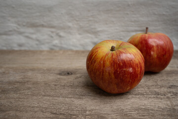 Two Apples on Wooden Boards Representing Nature with Copyspace