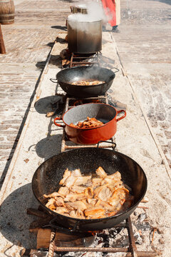 A row of pans filled with food