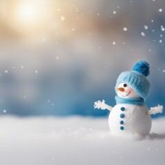 Fototapeta premium Cute snowman wearing blue scarf on a snowy area and bokeh light background