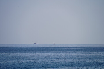 Obraz premium Fisher boat and buoy in mediterranean sea, open sea