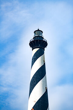 Cape Hatteras Lighthouse on the Atlantic Ocean in North Carolina. Against a blue sky background.