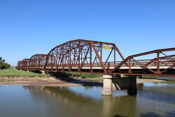 Oklahoma City, Oklahoma, USA; October 24 2023: The Lake Overholser Bridge in Oklahoma City is a proud reminder of historic old Route 66.
