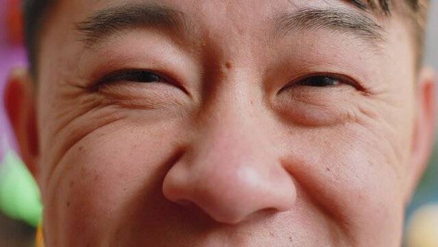 Diverse collage of happy joyful authentic men, women, children eyes close-up smiling face, looking at camera. Group of people grinning with gaze. Racial equality. Different races, nationalities, ages