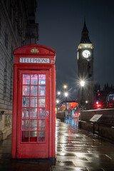 big ben and red telephone box at night