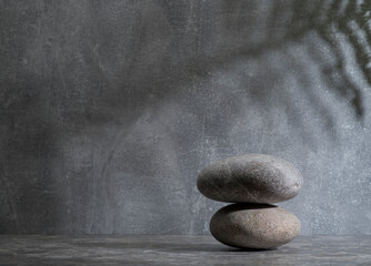 stones for product presentation podium. zen stones on a gray background