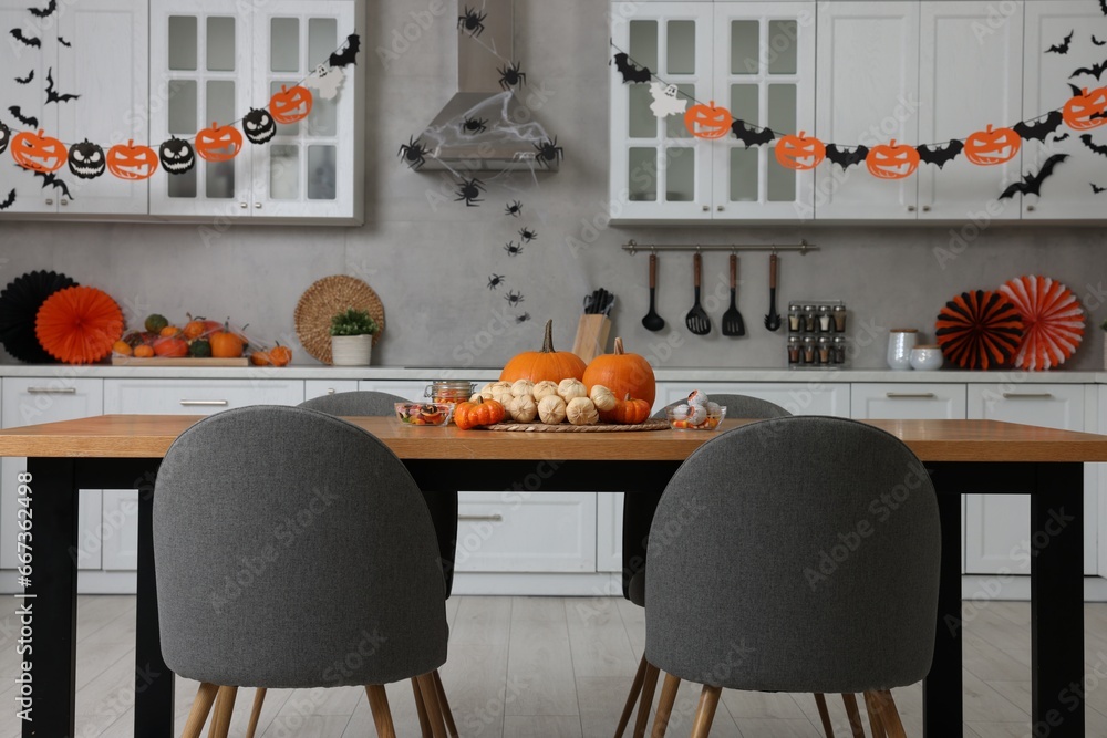 Poster Stylish kitchen interior with festive decor. Halloween celebration