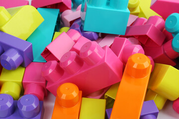 Colorful blocks as background, closeup. Children's toys