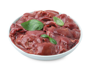 Plate of raw chicken liver with basil isolated on white