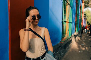 girl next to the Frida Kahlo Museum in Mexico