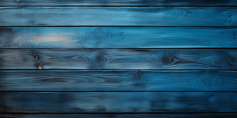 Textura de unos tablones de madera pintados de color azul, desgastados