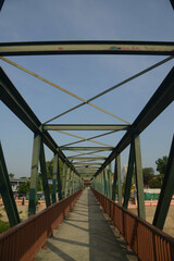 Ancient iron bridge crossing the Pa Sak river in Middle of Thailand.