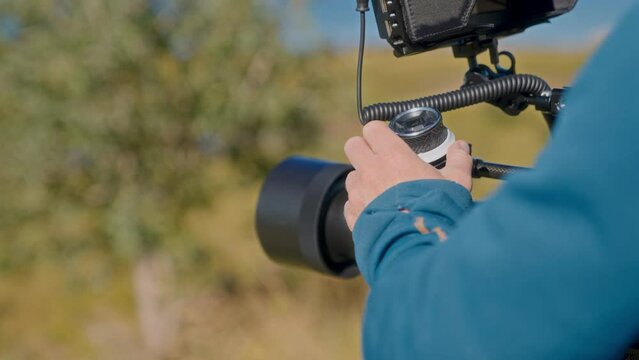 Holding A Recording Camera During Daytime
