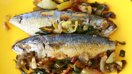 Grilled mackerel with dabu chili sauce.