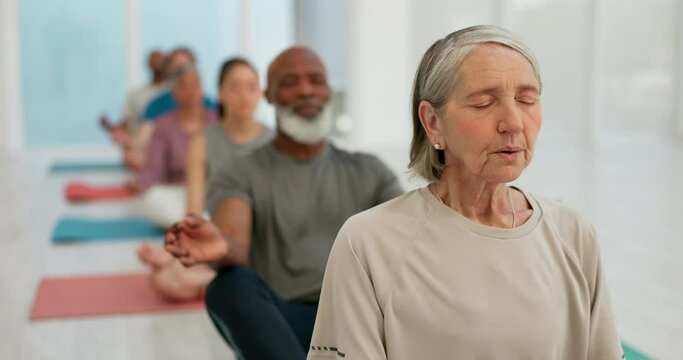 Yoga class, woman and meditation for fitness, calm and zen mindfulness in chakra, aura and holistic. Senior person, mental health and breathing exercise in retirement, self care and inner balance