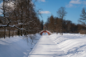 Cross bridge (Krestovy bridge) in the Alexander Park of Tsarskoye Selo on a sunny winter day,...