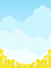 満開の菜の花と青空の風景（縦向き）