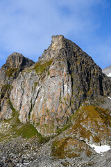 Sunny snow and mountain landscape in Hamilton Bay, Rand Fjord, Svalbard, Arctic
