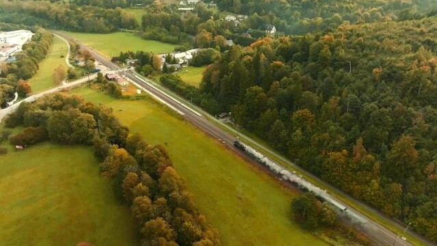 Aerial shot of Historical train driving with smoke. Train used by Czech legionaries in World War I, Czech Republic.