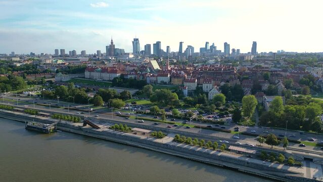Aerial panorama of Warsaw, Poland over the Vistual river and City center in a distance Old town. Downtown skyscrapers cityscape. Business