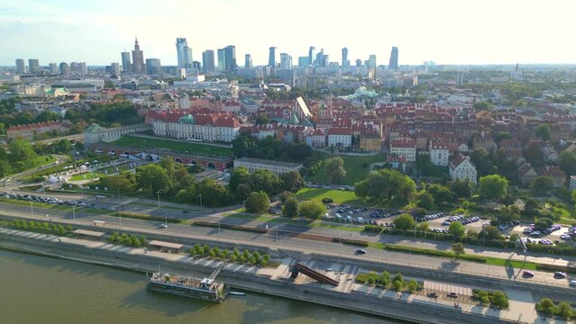Aerial panorama of Warsaw, Poland over the Vistual river and City center in a distance Old town. Downtown skyscrapers cityscape. Business