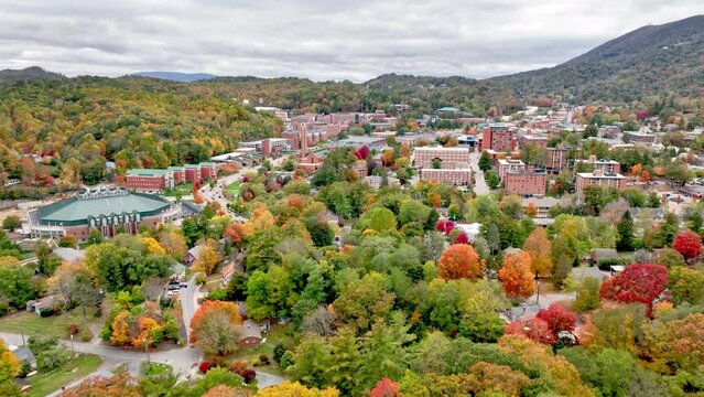 aerial push in to boone nc, north carolina and the appalachian state university campus