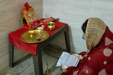 indian women chanting holy mantras at home for spiritual wellbeing from different angle