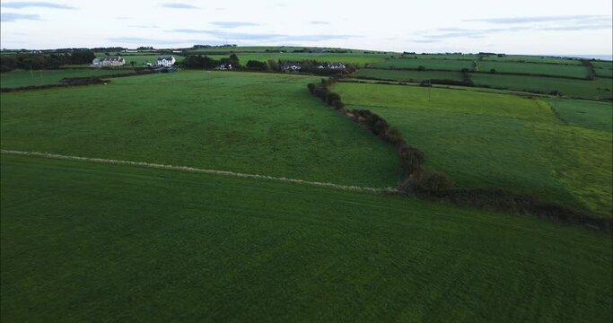 Green Countryside Farm Fields in Kenmare, County Kerry, Ireland - Aerial