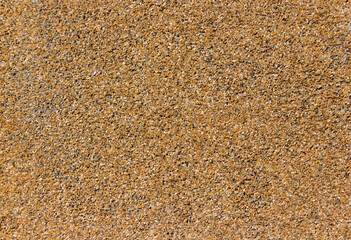 texture of tiles made of pressed river quartz sand close-up